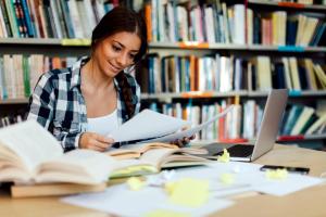 female-student-using-laptop-study-taking-notes_36eabb80-e7be-11e6-aaaa-0e8ad0958364